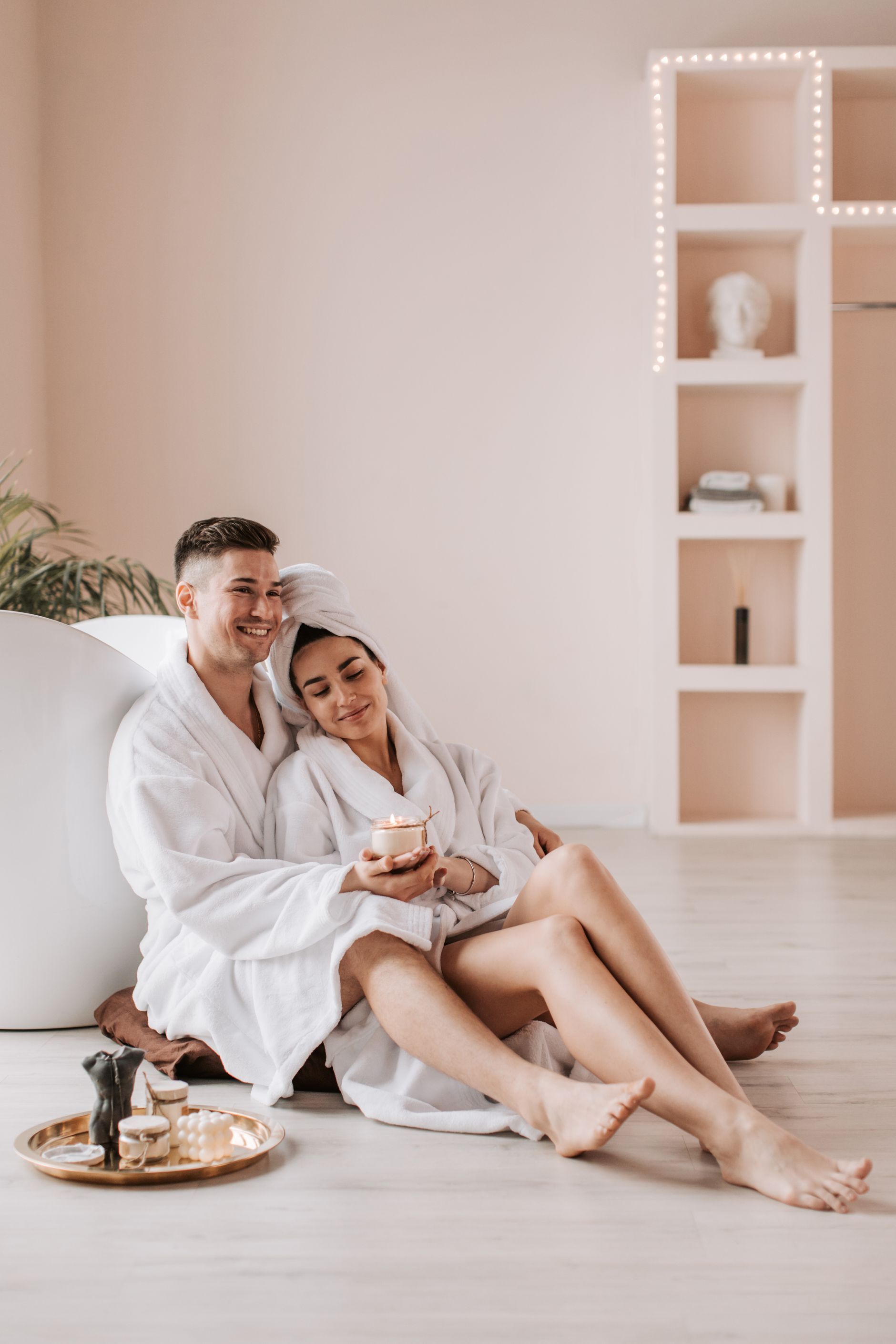 Couple relaxing in spa robes