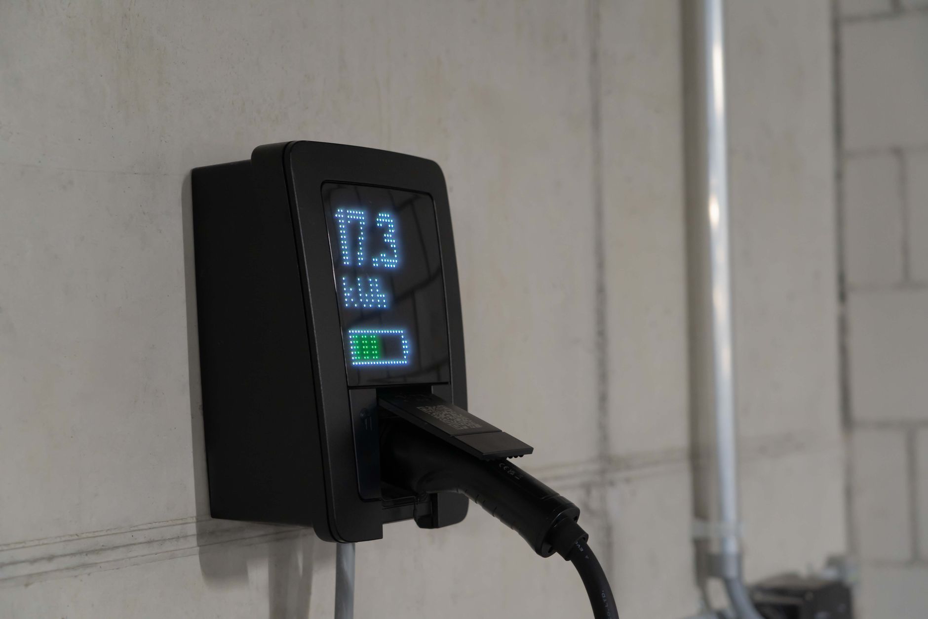 Wall-mounted EV charger