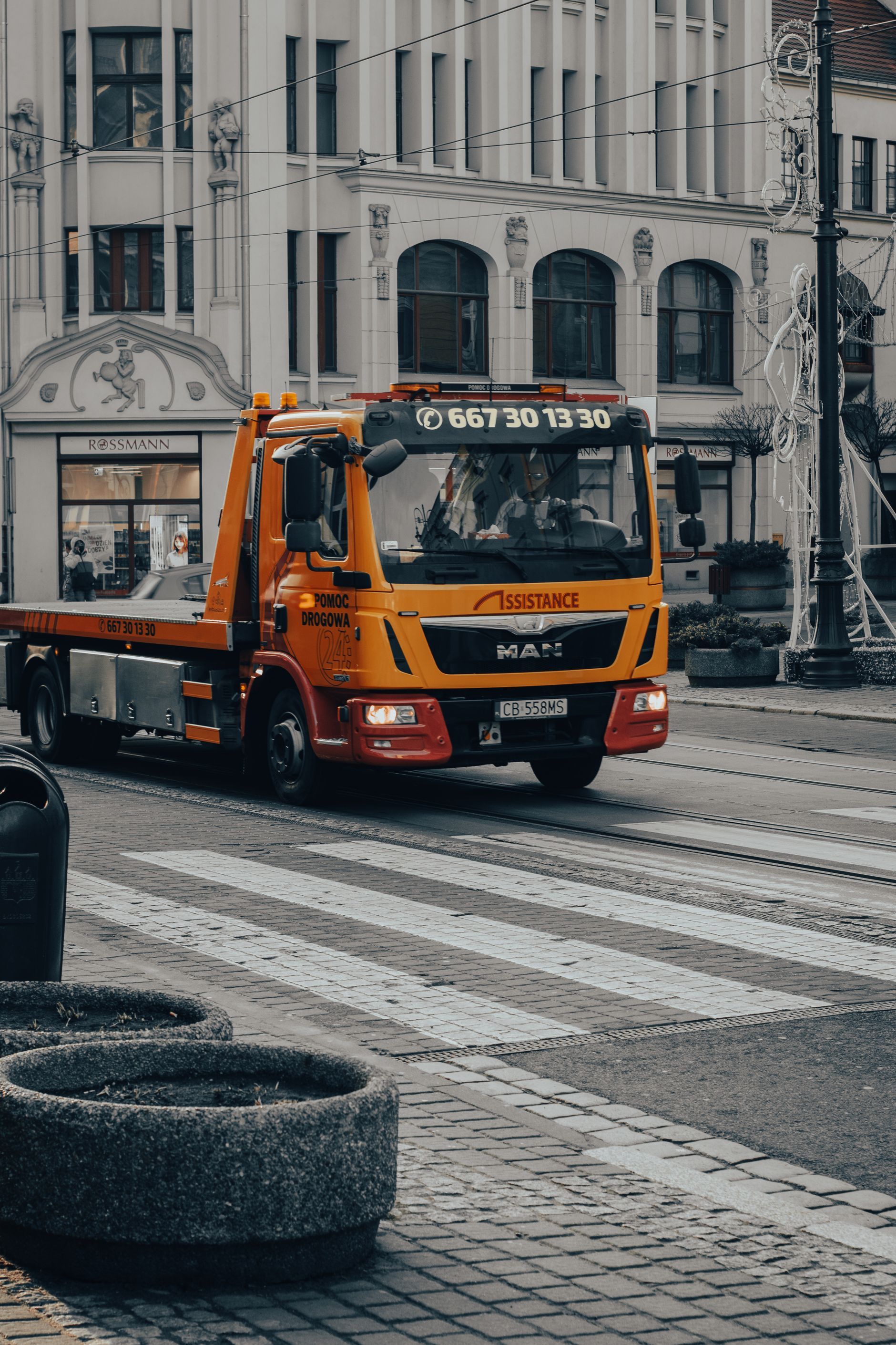 Flatbed tow truck on the road