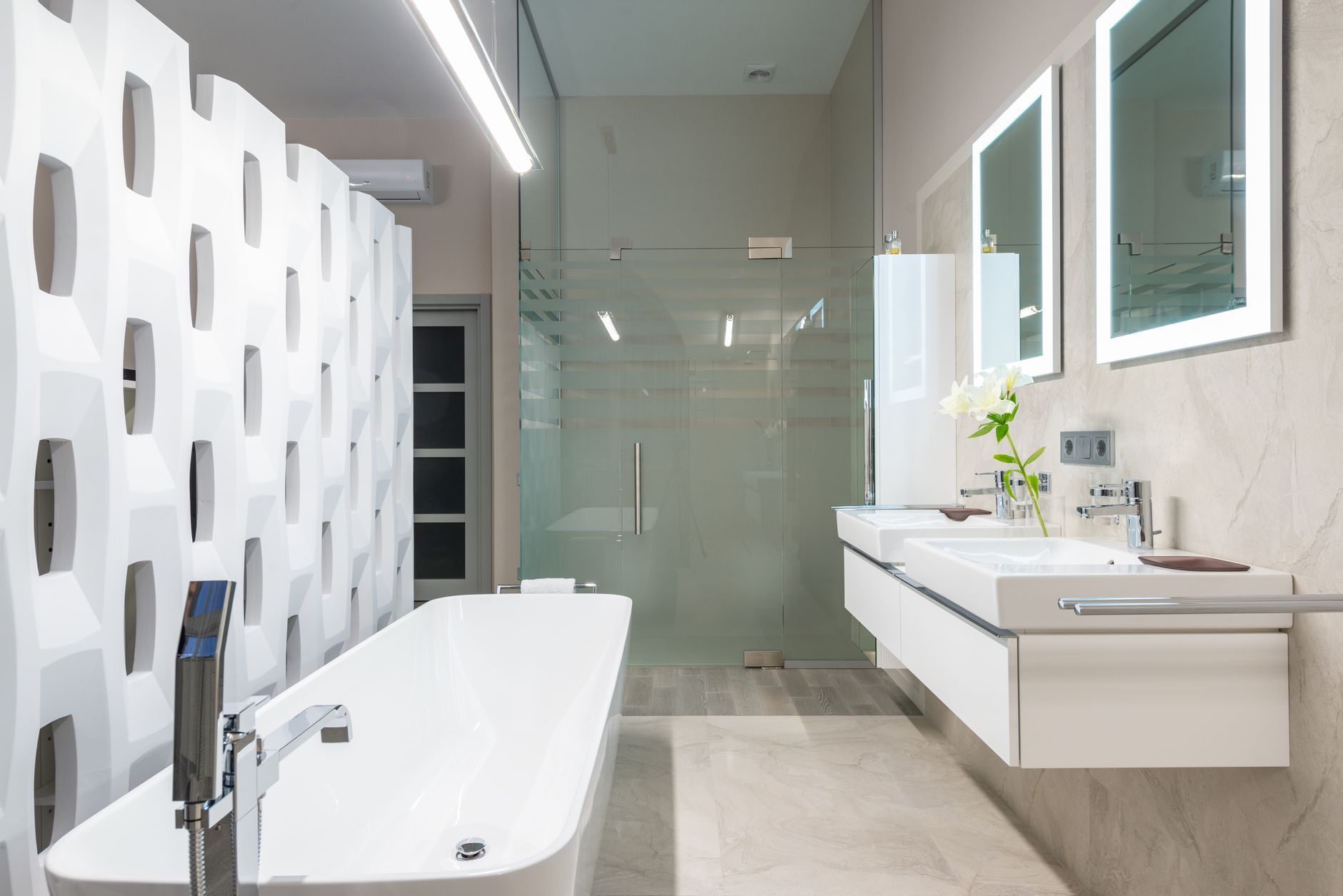 Renovated bathroom with a glass shower